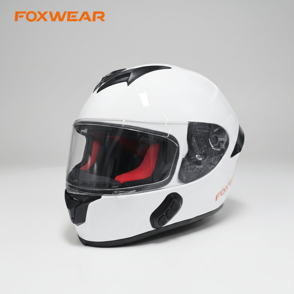 White motorcycle helmet with clear visor on a white background, featuring the Foxwear brand.