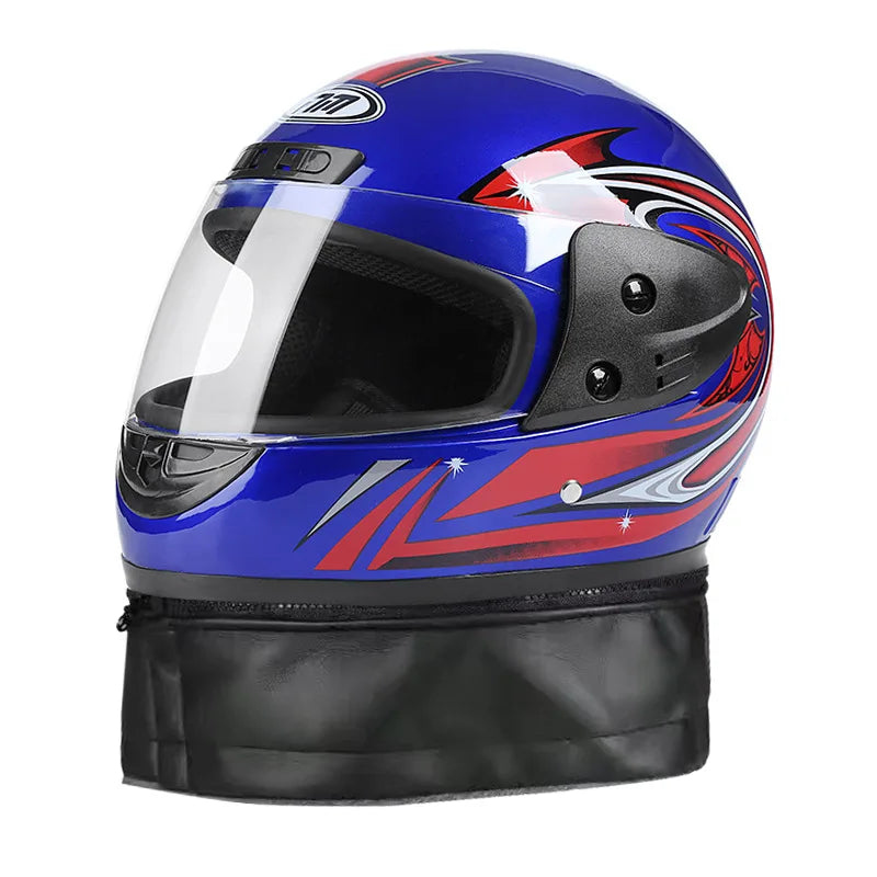Blue and red motorcycle helmet with a black bag underneath on a white background