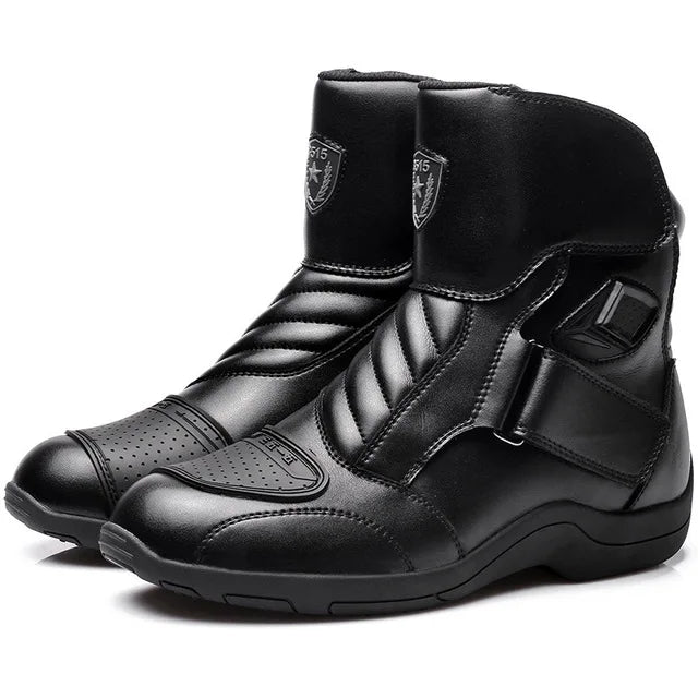 Black motorcycle boots with brand logo on a white background