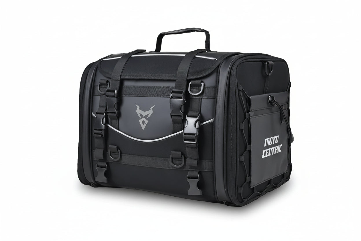 Black motorcycle travel bag with 'Moto Centric' branding on a white background