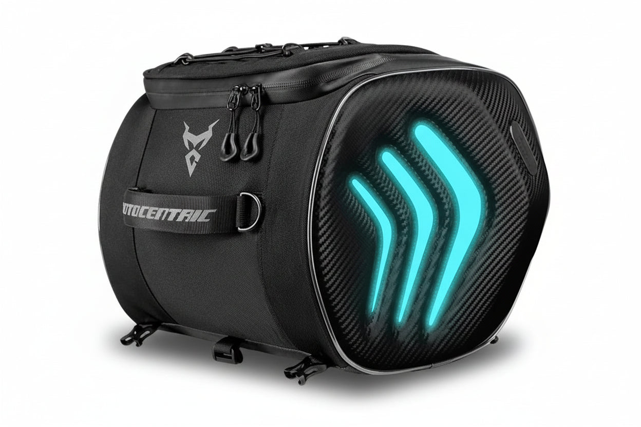 Black motorcycle saddlebag with glowing blue design on a white background