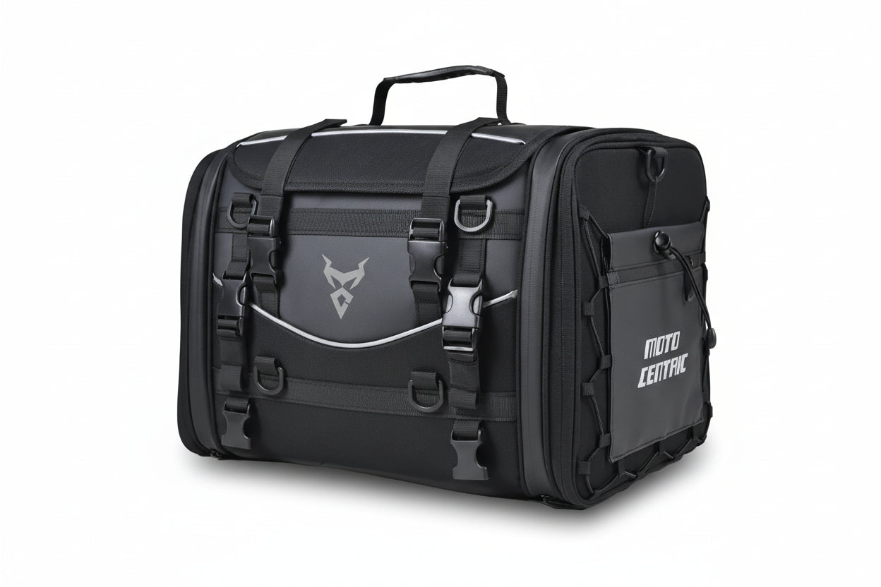 Black motorcycle travel bag with 'Moto Centric' branding on a white background