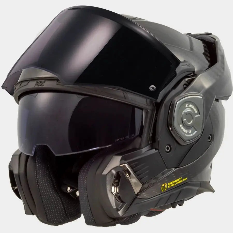 Black motorcycle helmet with visor on a white background