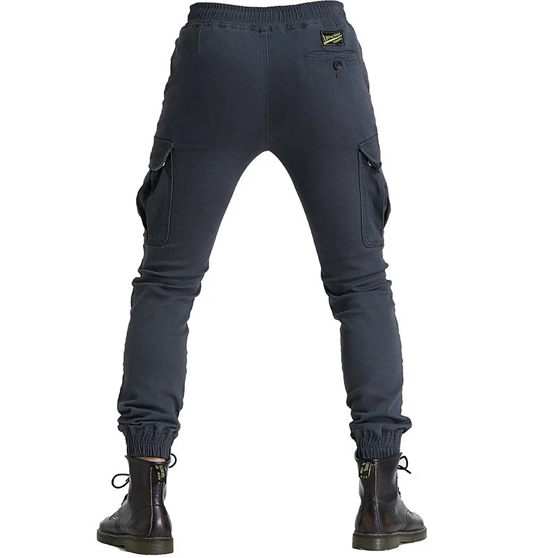 Dark gray cargo pants with visible brand logo on a white background