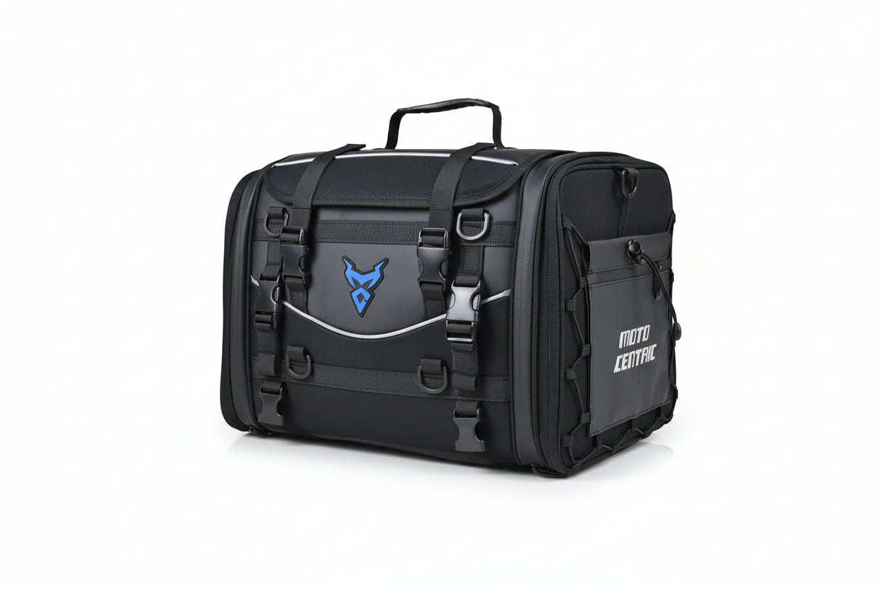 Black motorcycle travel bag with visible 'Moto Centric' branding on a white background.