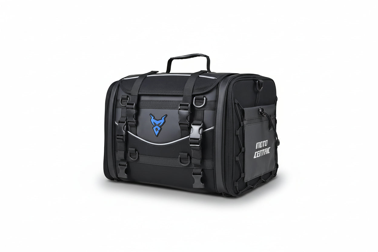 Black motorcycle travel bag with visible 'Moto Centric' branding on a white background.