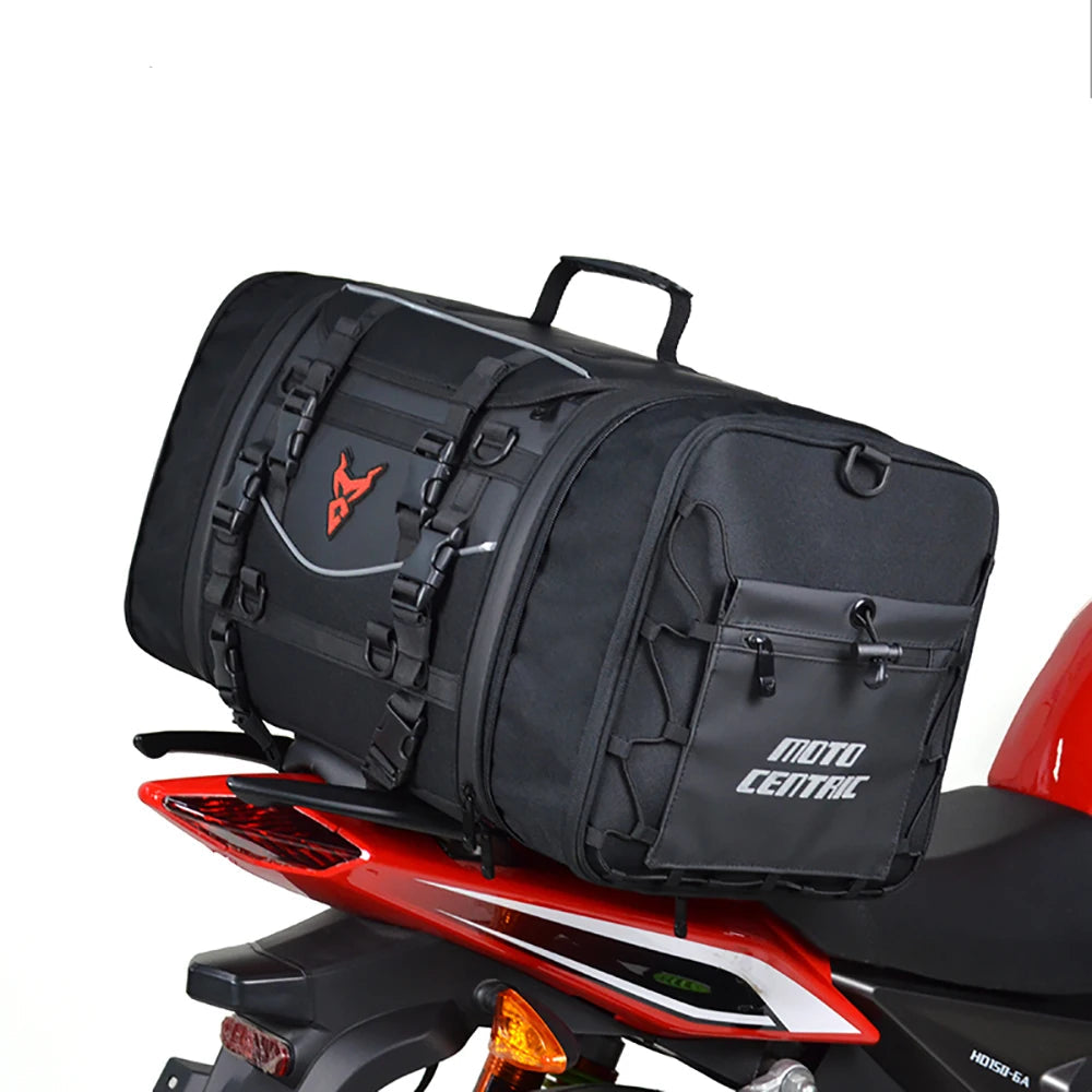 Black motorcycle luggage bag on a red motorcycle with Moto Centric branding.