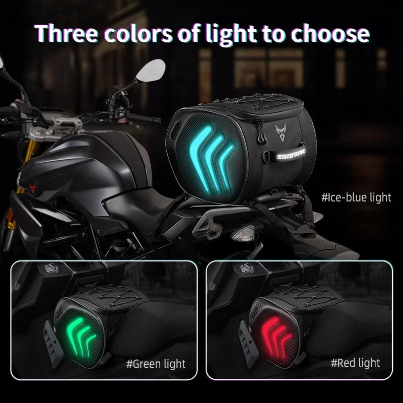 Motorcycle with turn signals showing ice-blue, green, and red lights on a dark background.