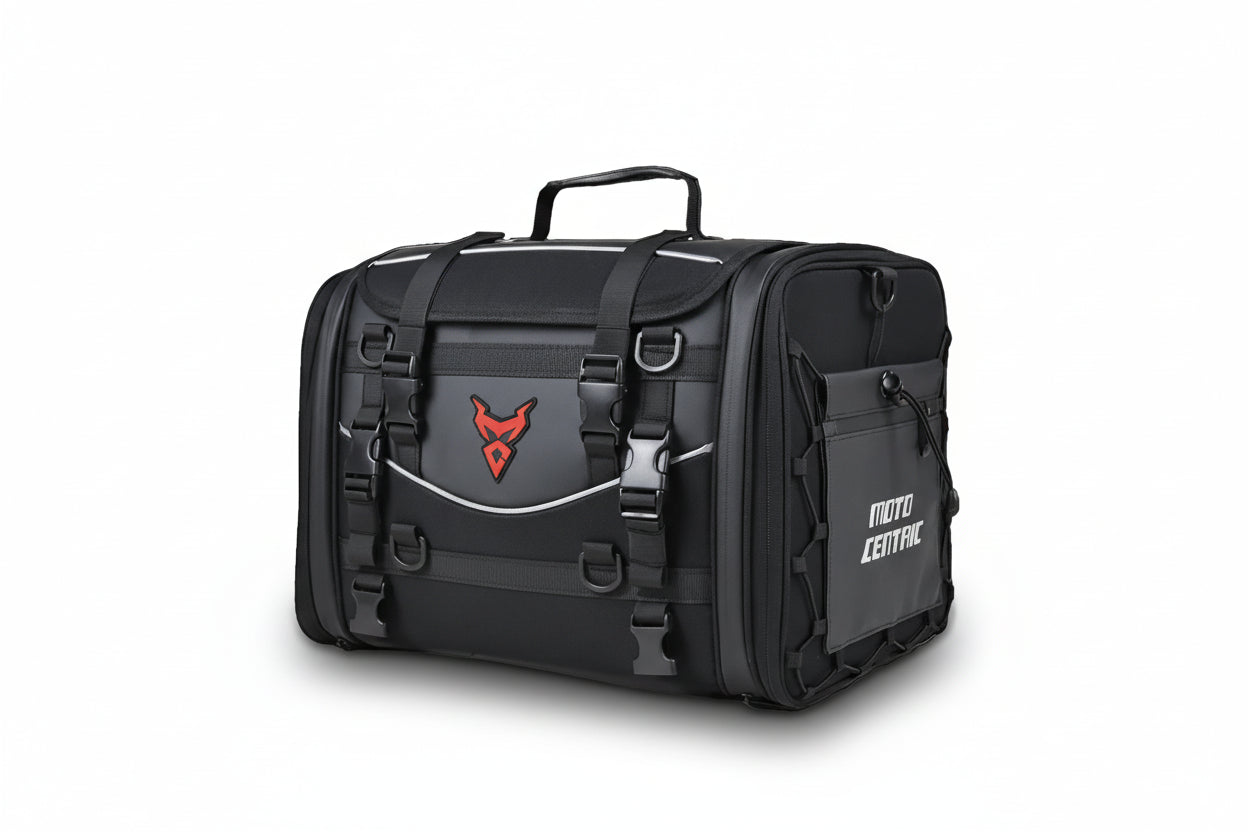 Black motorcycle travel bag with visible 'Moto Centric' branding on a white background.
