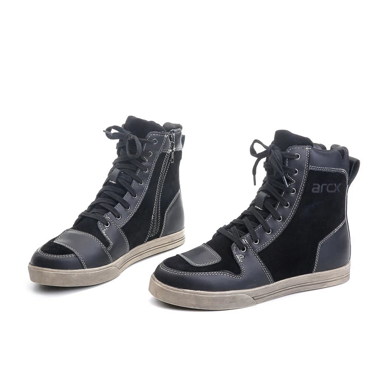 Black and gray high-top sneakers with 'arcx' branding on a white background