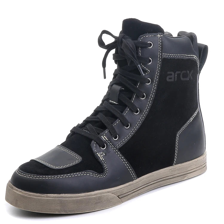 Black high-top sneaker with visible Arcx branding on a white background