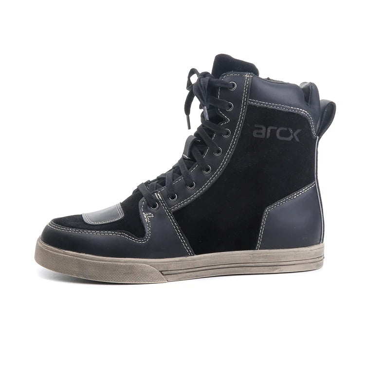 Black high-top sneaker with 'arcx' branding on a white background