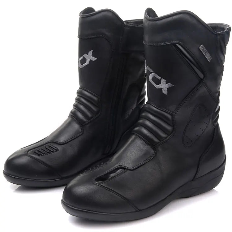 Black motorcycle boots with 'arcx' branding on a white background