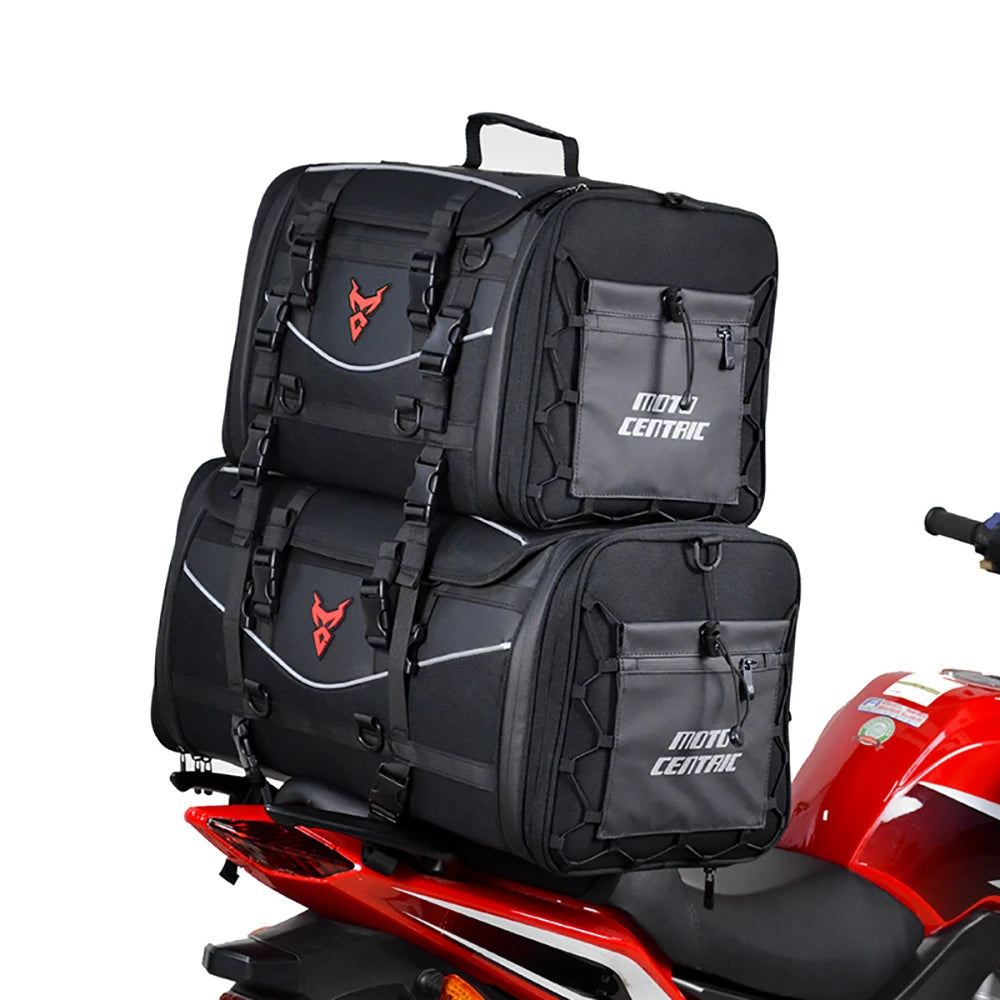 Black motorcycle travel bag with 'Moto Central' branding on a red motorcycle.